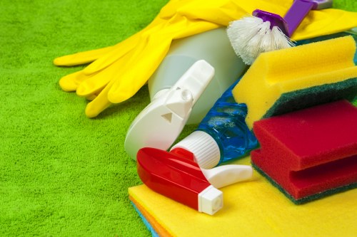 Routine house cleaning supplies arranged for a home cleaning schedule